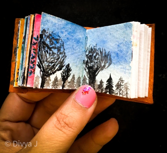 Watercolor Painting Tree and Sky on Mini Watercolor book